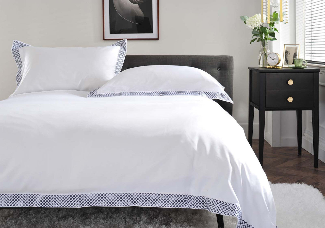 The Anmer Bed Linen Set in Blue - Dressed Bed - Closeup