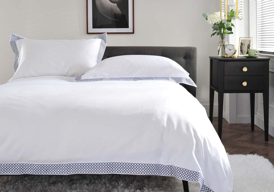 The Anmer Bed Linen Set in Blue - Dressed Bed - Closeup