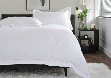 The Belvedere Bed Linen Set in Blush - Dressed Bed - Closeup